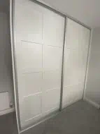 2 door sliding wardrobe with twin caraway panels in white with brushed silver frames, fitted in Thirsk (differnt angle)